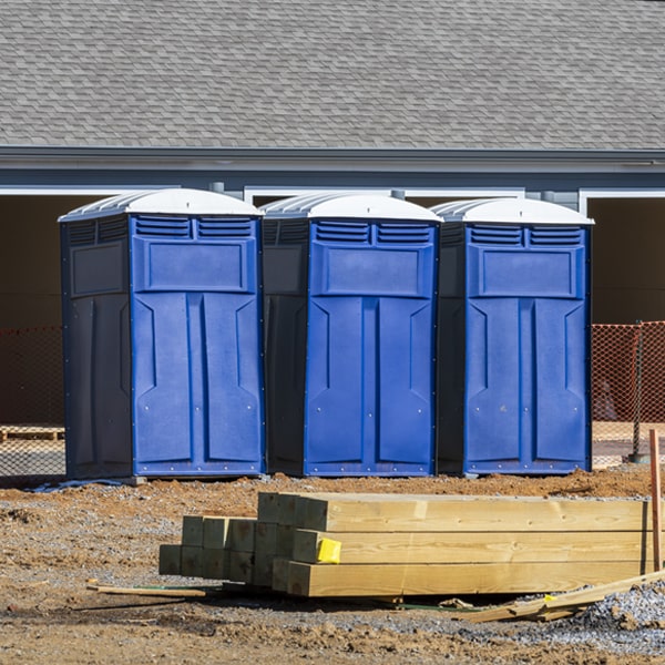 how often are the portable toilets cleaned and serviced during a rental period in Portage Lakes